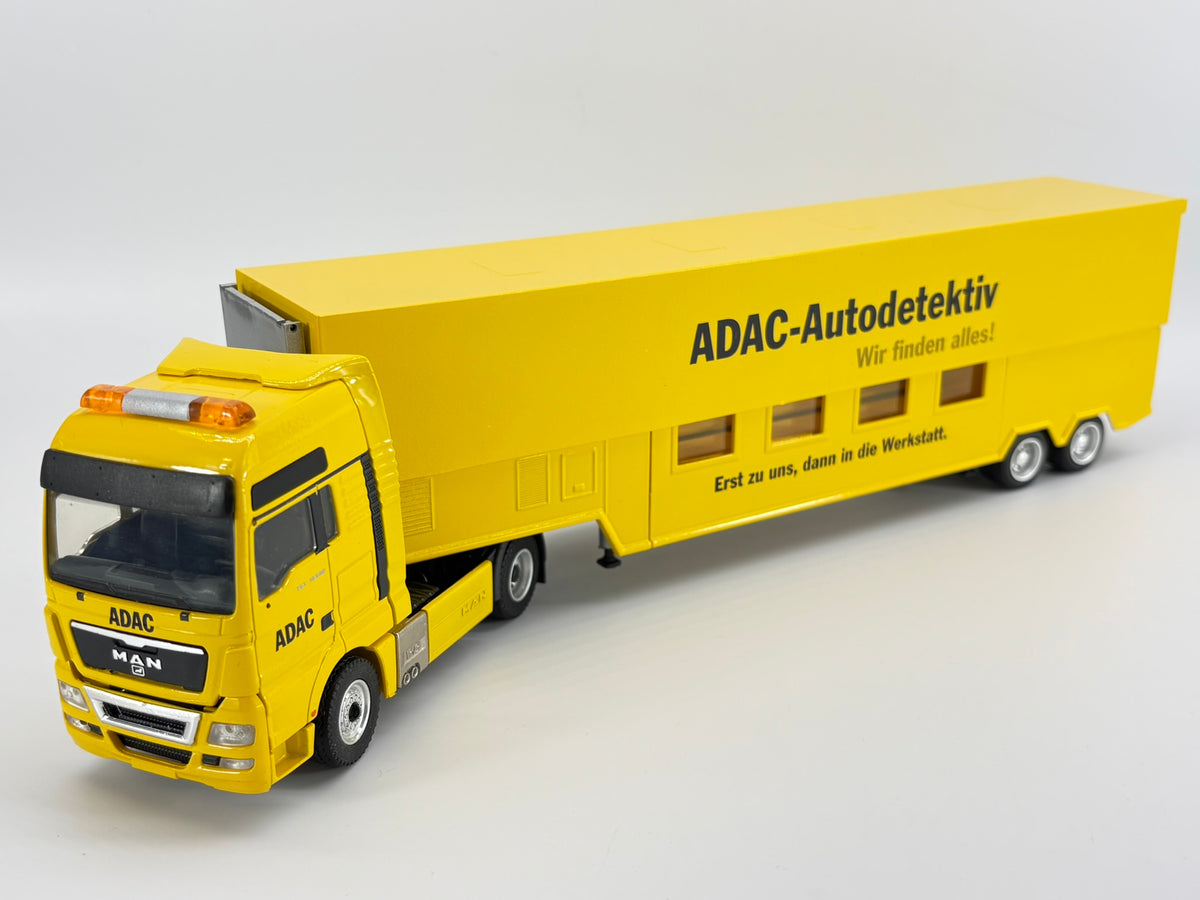 Conrad MAN TGX Prüfstandsauflieger „ADAC“ – Diecast Sammlermodell im Maßstab 1:50, Art. 70170/0