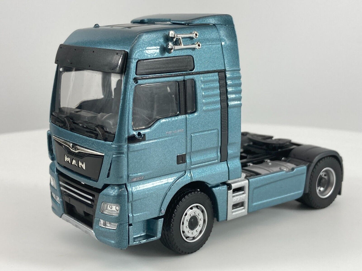 Conrad MAN TGX XXL Euro6 Sattelzugmaschine 18.640 D38 – Diecast Sammlermodell im Maßstab 1:50, Art. 76000/20