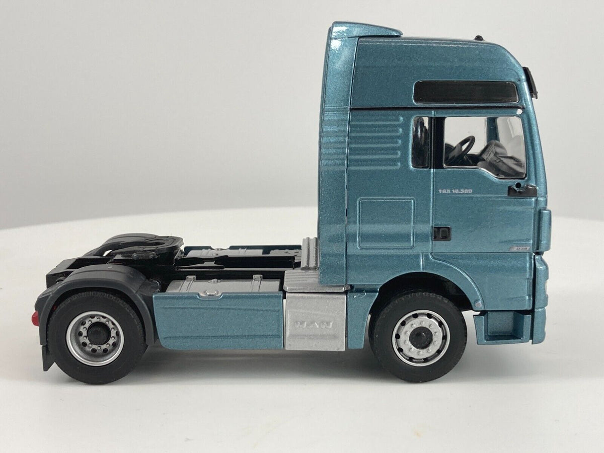Conrad MAN TGX XXL Euro6 Sattelzugmaschine 18.640 D38 – Diecast Sammlermodell im Maßstab 1:50, Art. 76000/20 – Ansicht 4