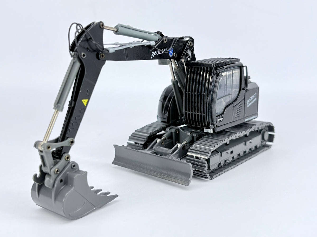 Conrad Liebherr R920 Compact Raupenbagger „GEOMER Kampfmittelbeseitigung“ – Diecast Sammlermodell im Maßstab 1:50, Art. 2209/06