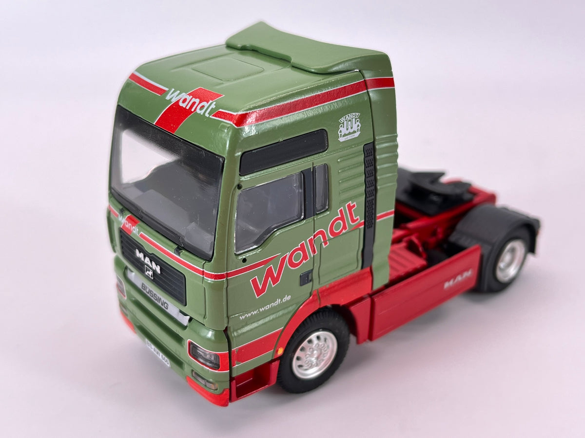 Conrad MAN TGX 41 Sattelzug „Wandt Spedition“ – Diecast Sammlermodell im Maßstab 1:50, Art. 6607/0